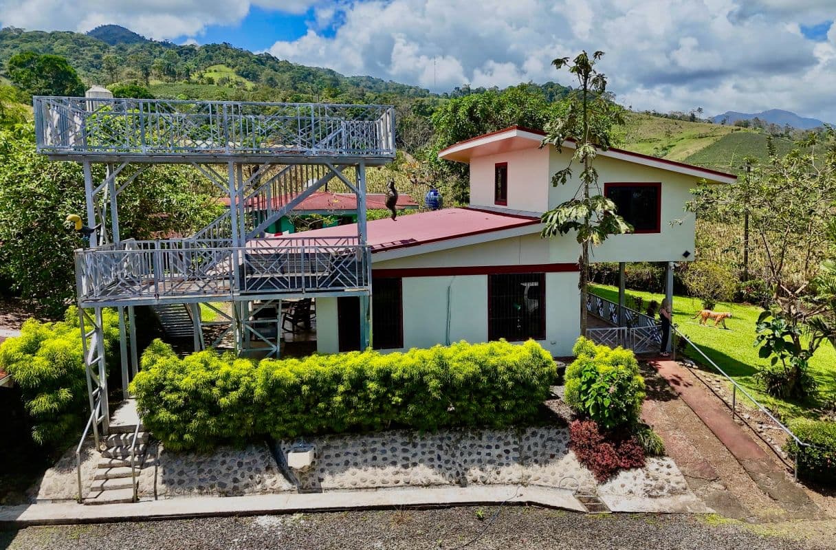 Turnkey Volcano View Renovated Home with a River on 1.4 Acres & 2,000 SF Workshop in La Tigra Near La Fortuna Costa Rica