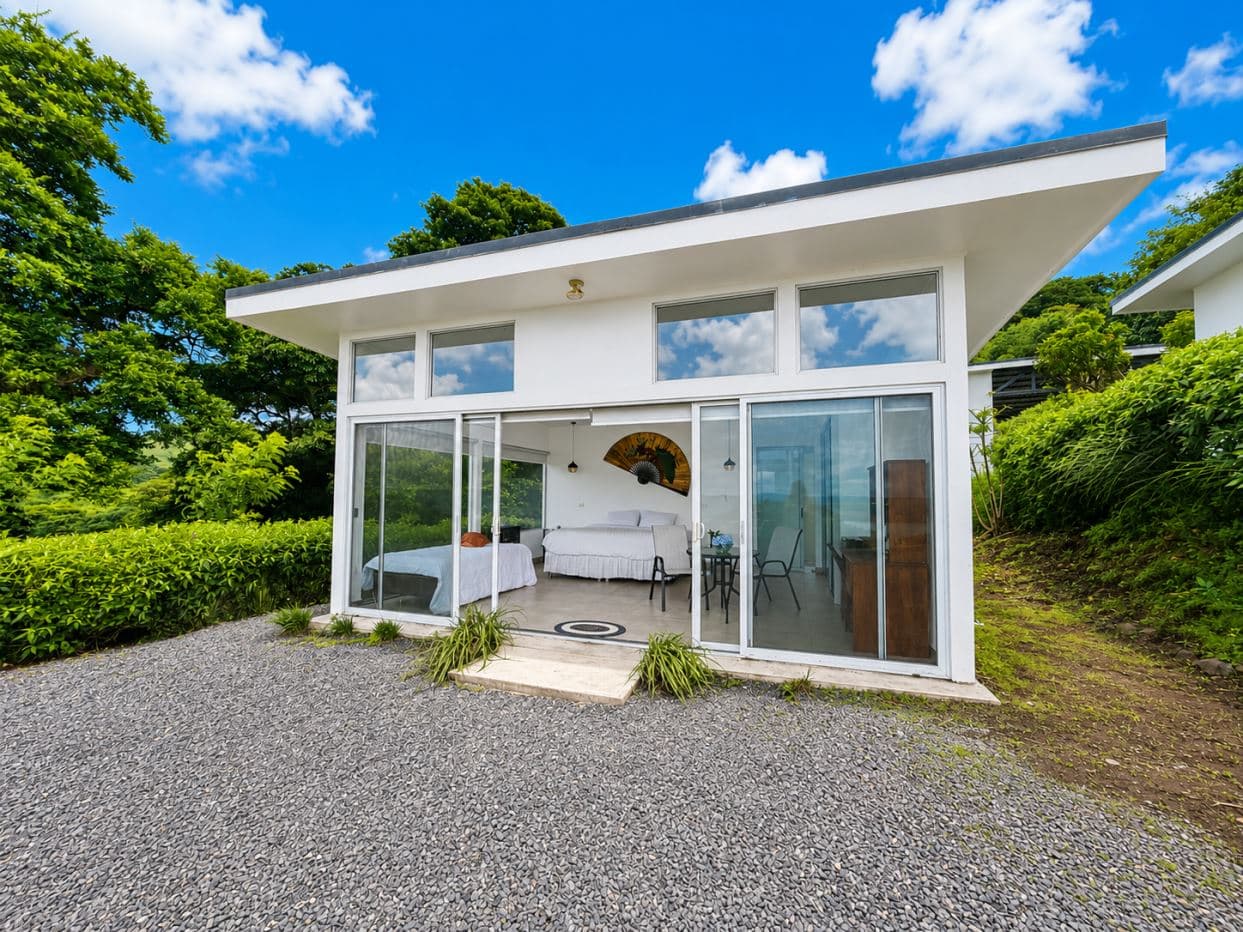 Architectural Mountain Hospitality Estate with Six Private Villas, Indoor Pool & Panoramic Lake Arenal Views, photo 17