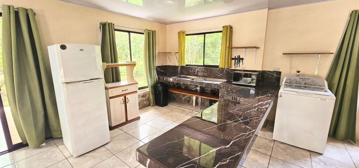 8,000 m² Riverfront Property in La Tigra | Home, Pool, Cabina & Business Potential, photo 5